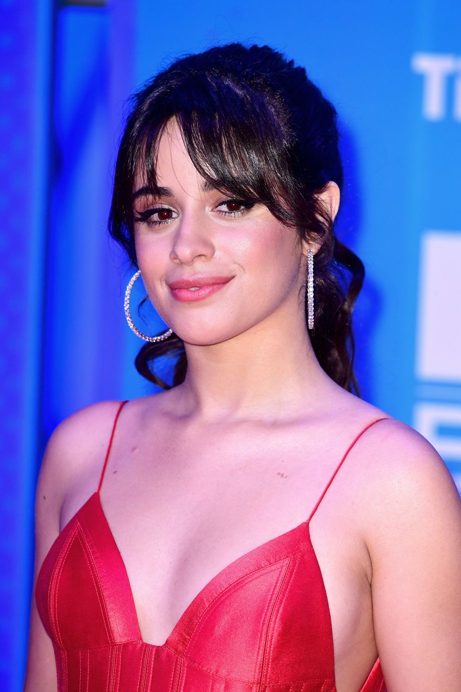 Camilla Cabello wearing a red dress